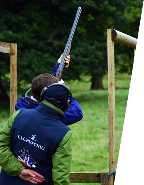 E.J.Churchill giving clay shoot instruction