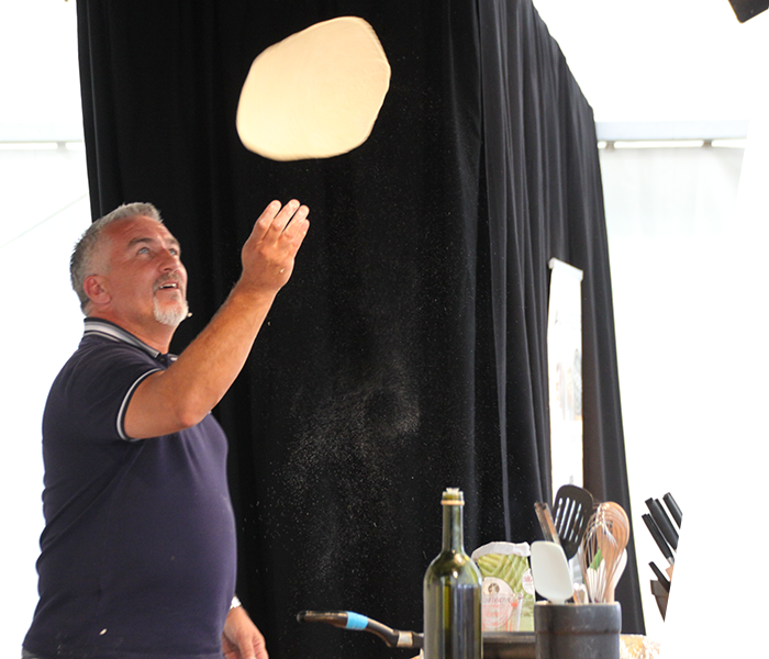 Paul Hollywood spinning dough into the air at last years demo